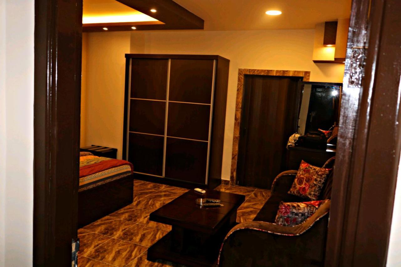 Al Riyati Hotel Apartments Акаба Экстерьер фото
